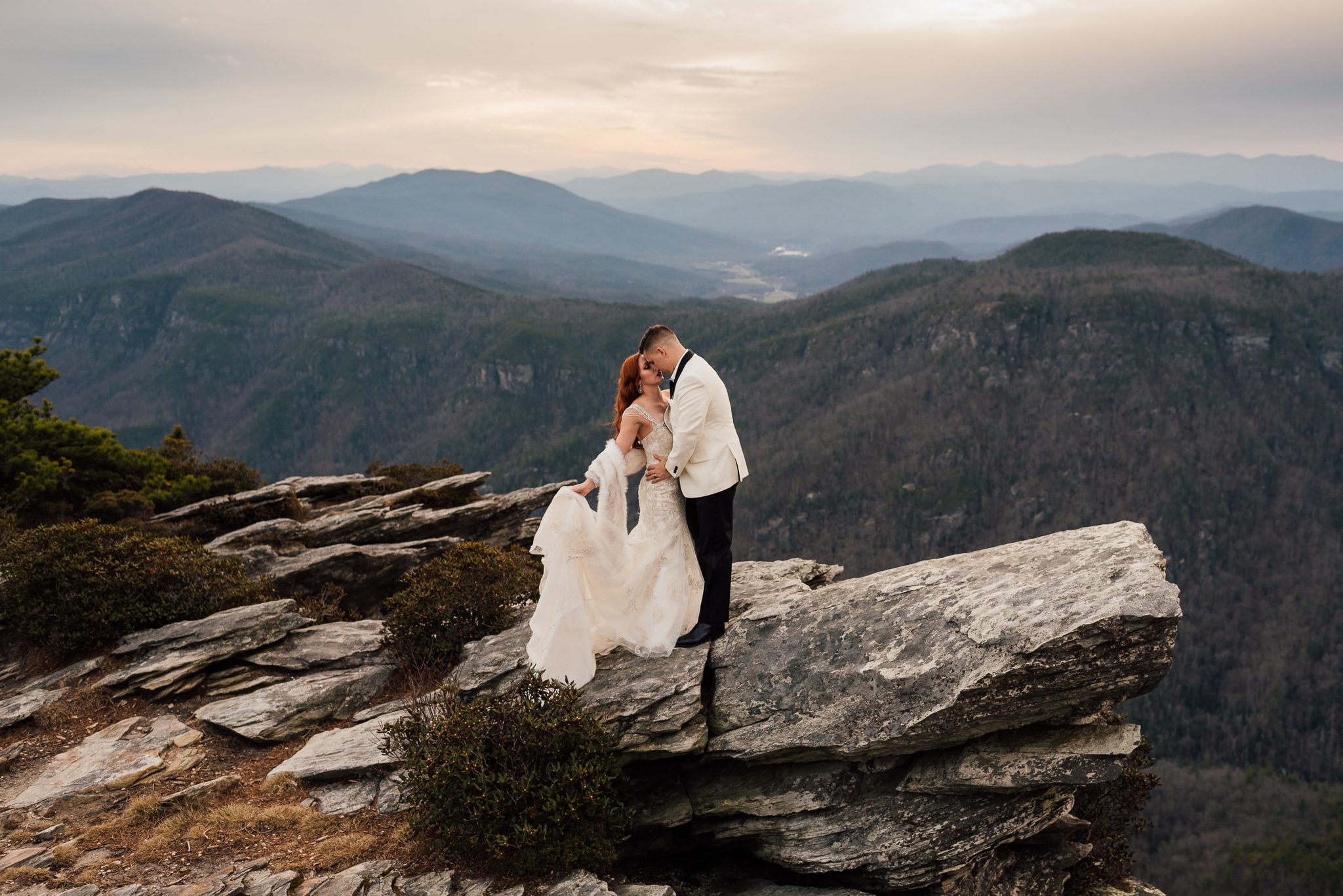 Adventure elopement portrait at Hawksbill overlook in the Linville Gorge